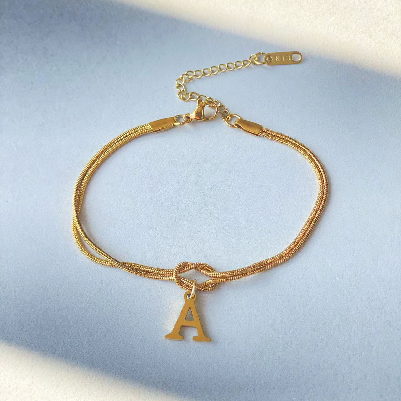 The Someone A-Z Love Knot Bracelet