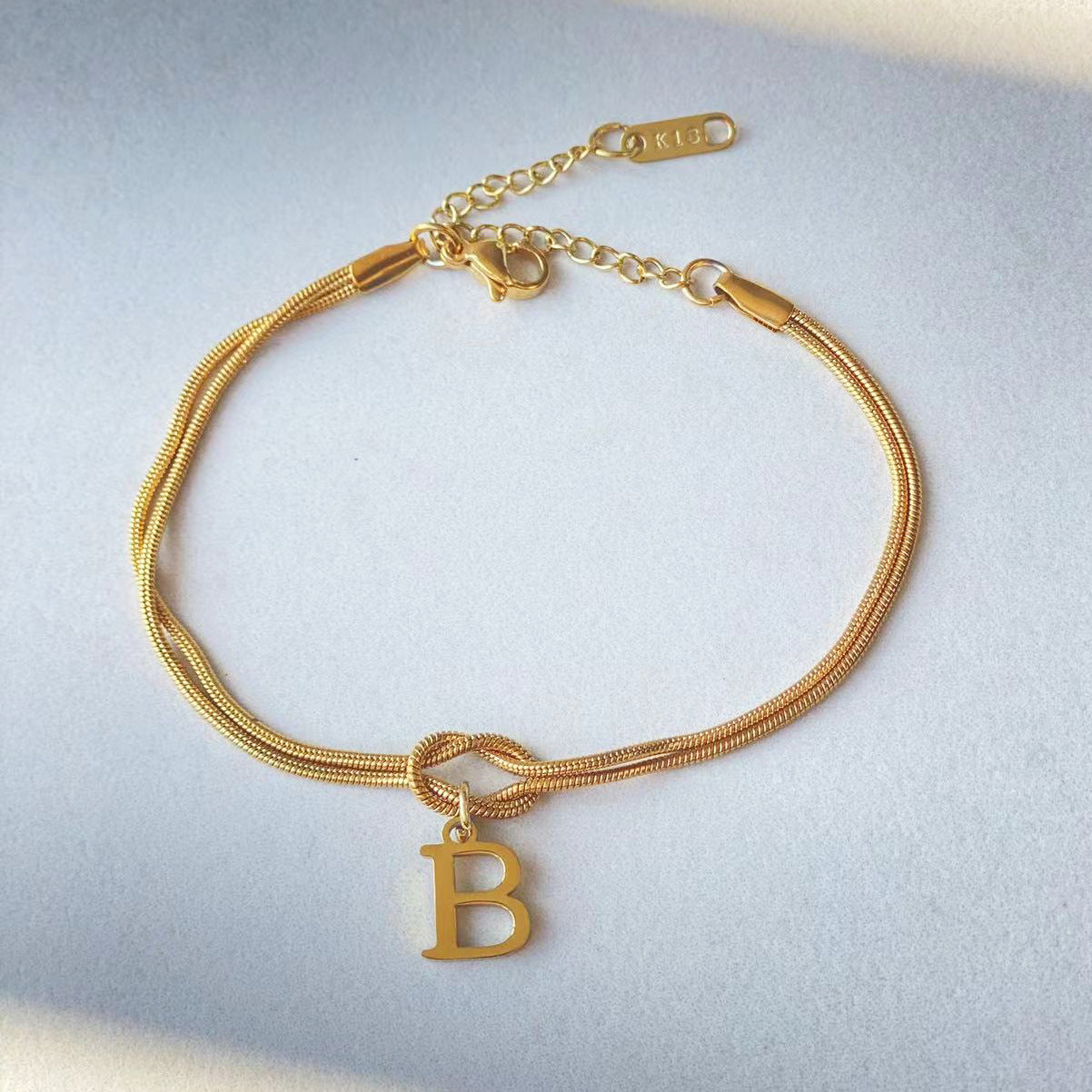 The Someone A-Z Love Knot Bracelet